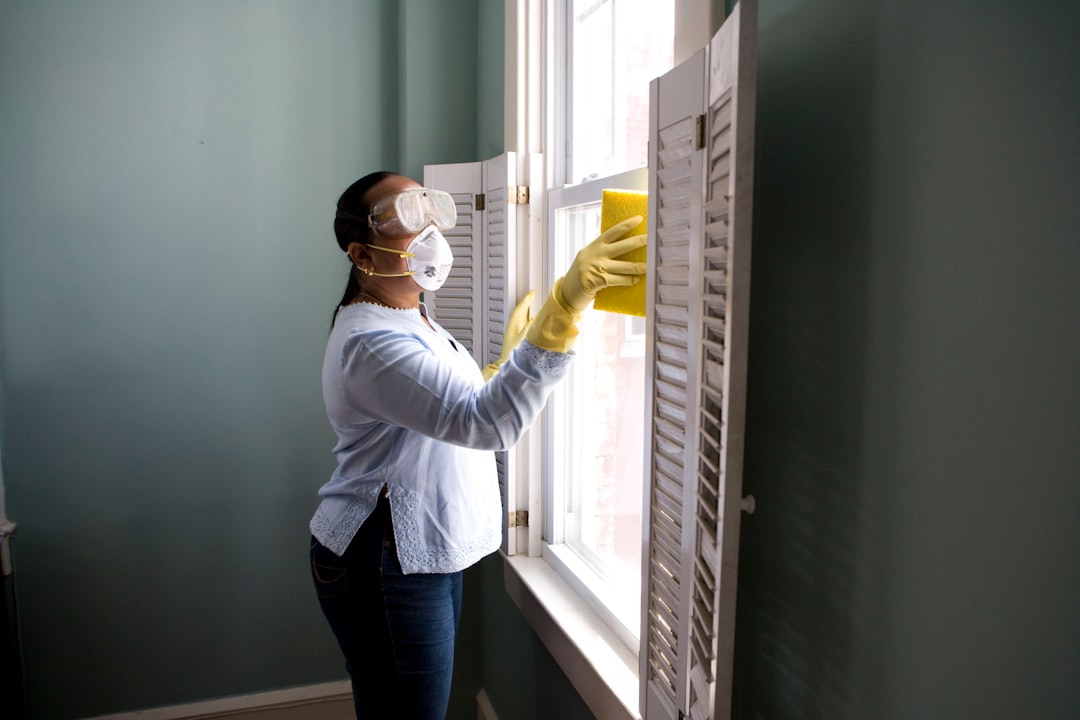 why-choose-us When renovating a home, you should use a damp sponge or cloth to clean dust collected on a window sill, as the dust may contain asbestos or lead-based paint. Home maintenance is an ongoing process for any homeowner, and here we see an African- American woman who’d taken a damp sponge to her window’s frame, in order to remove accumulated dust particulates. Note how the homeowner had donned a pair of waterproof gloves, a facemask, and a pair of goggles, prior to beginning this task.